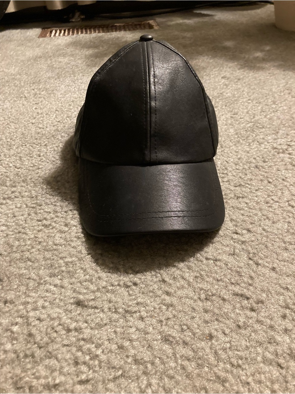 Faux leather baseball cap.